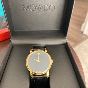 Movado Man’s watch black band only worn 2x in box